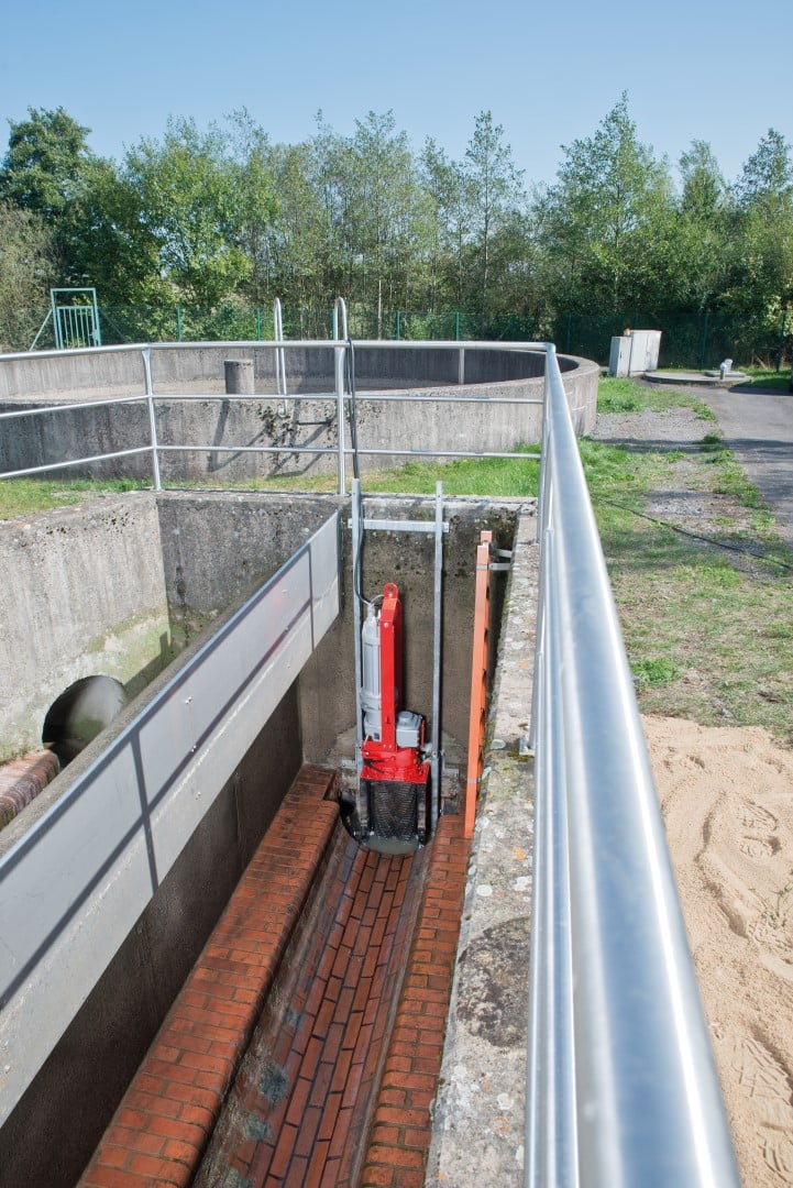 XRipper twin-shaft grinder installed upstream of the outlet of an open waste water collection shaft